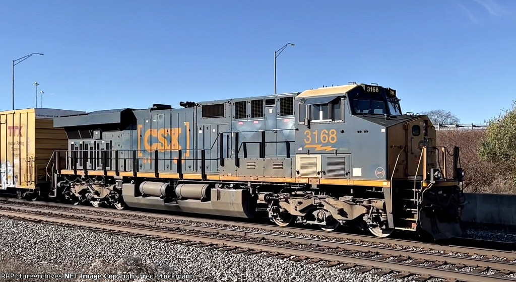 CSX 3168 leads a mixer east on 1.